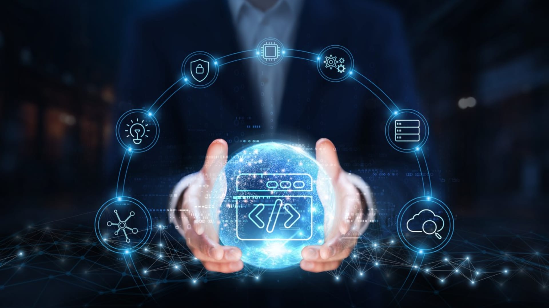 Businessperson holding a glowing digital sphere with a code icon at the center, surrounded by connected technology and cloud computing icons.